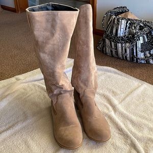 Tall tan suede like material. Worn once.. size 8